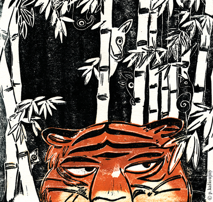 les yeux d'un tigre dans une forêt de bambous